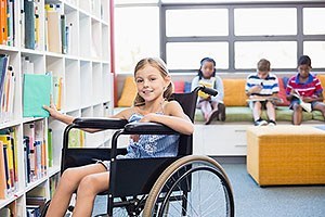 Child in wheelchair at school